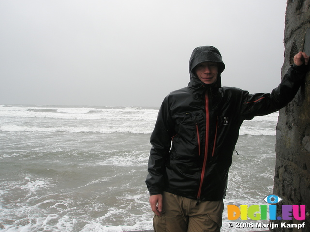 JT00837 Marijn at Tramore Lifeguard House in rain